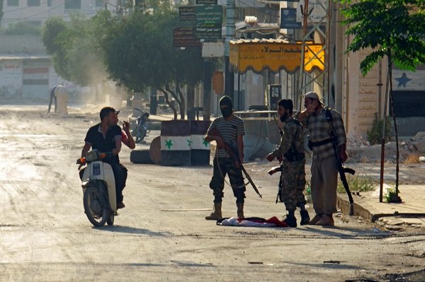 Jund al-Aqsa group man a checkpoint