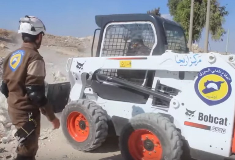 Click to enlarge White Helmets with Bobcat
