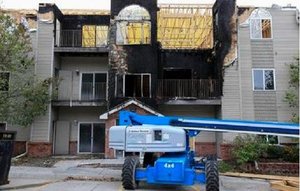 Click to enlarge damaged apartment