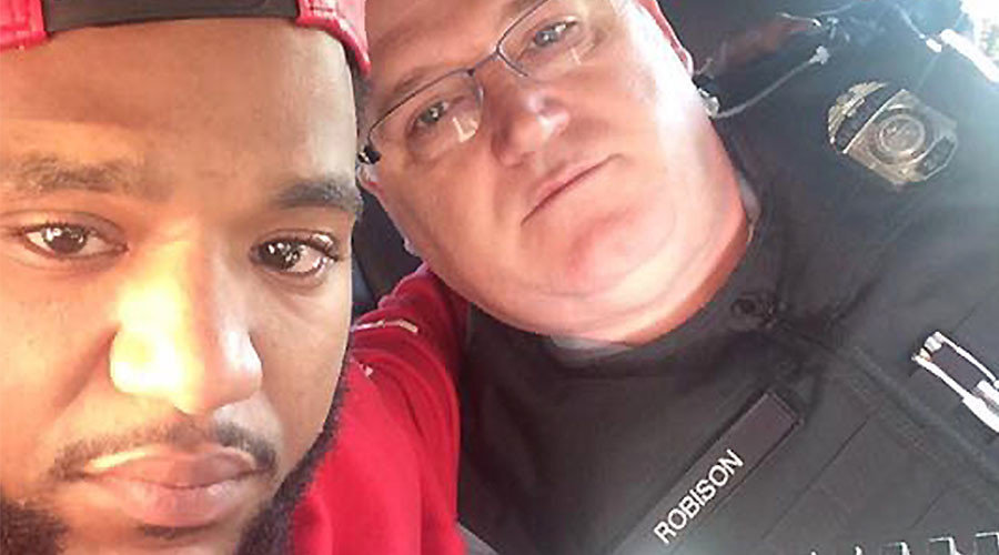 Mark E Ross and officer, Sgt. David Robison of the Ohio State Highway Patrol