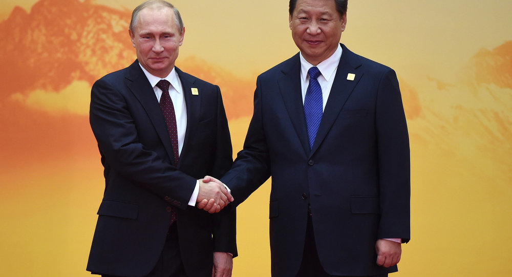 Vladimir Putin and Xi Jinping
