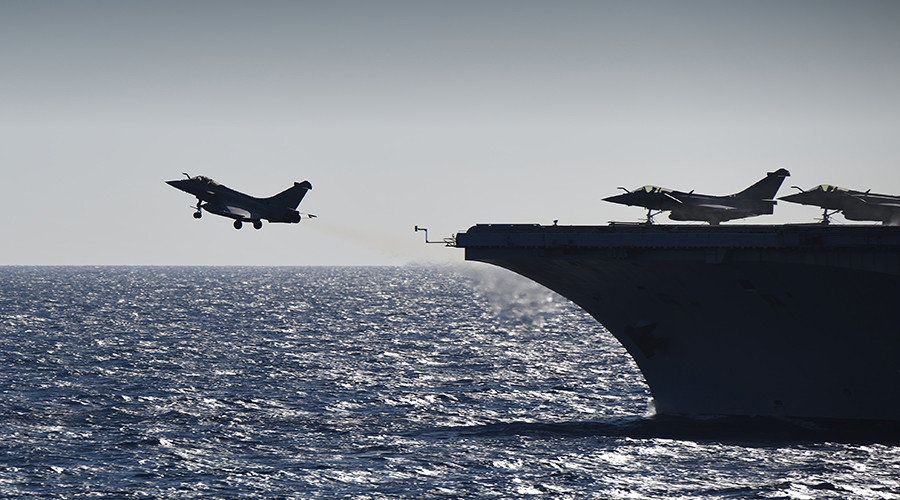 rafale fighter jet takes off from the French aircraft carrier