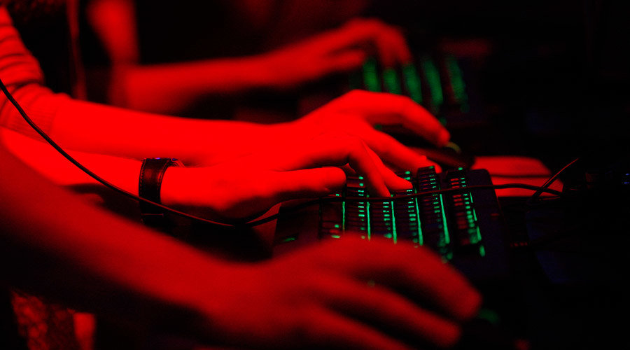 people typing on computer keyboard