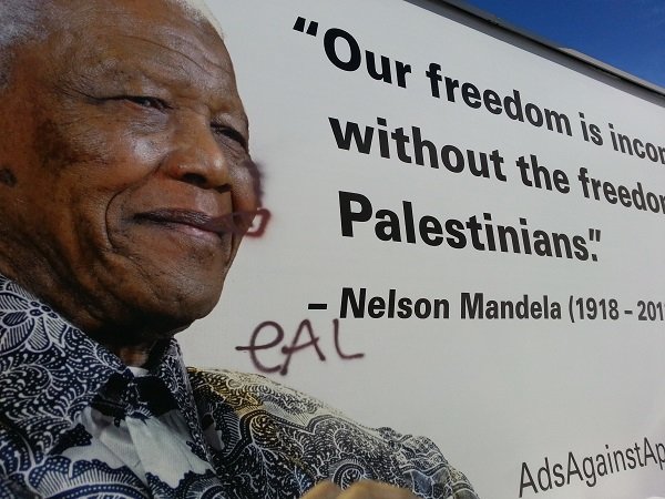 Mandela ad in the US, defaced by vandals