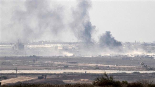  smoke rising from the besieged Gaza Strip