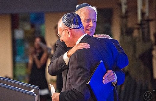 Joe Biden hugs Stu Eizenstat
