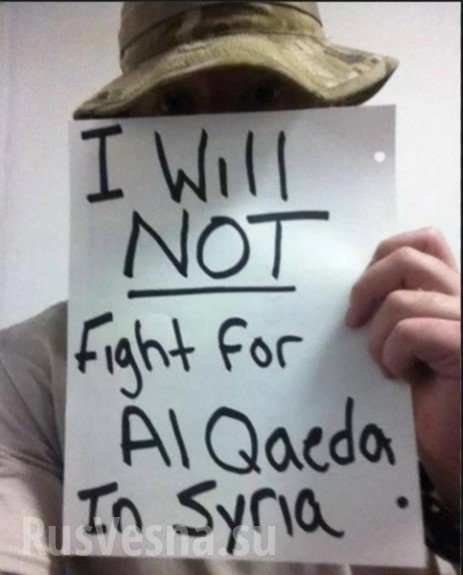 Click to enlarge American soldier holding sign