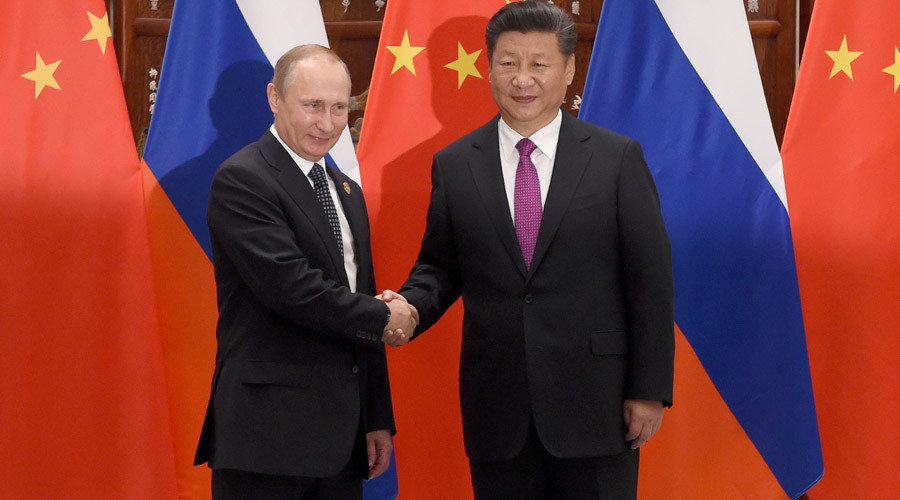  Chinese President Xi Jinping with Russian President Vladimir PutinWang Zhao/Reuters