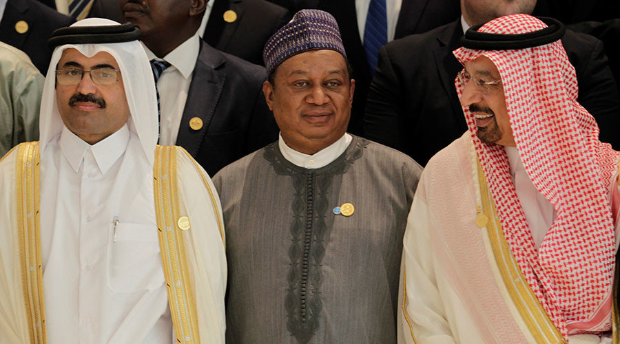 Secretary General of Opec Mohammed Sanusi Barkindo (C), poses with Saudi Energy Minister Khalid al-Falih (R) and OPEC President Qatar's Minister of Energy and Industry Mohammed bin Saleh al-Sada