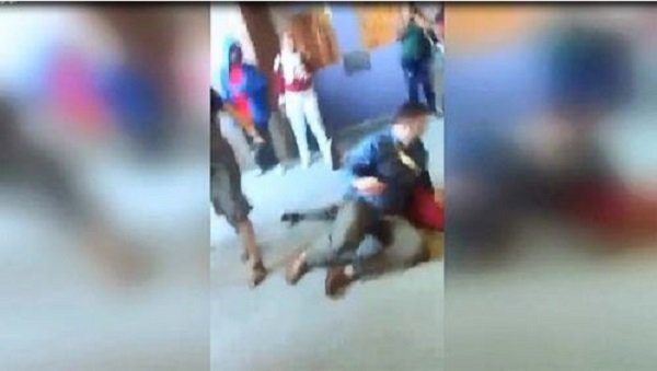 cop body slams student