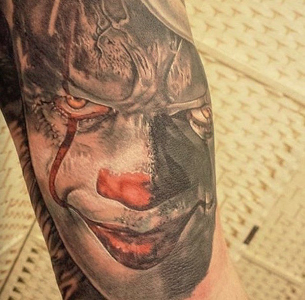Creepy clown tattoo