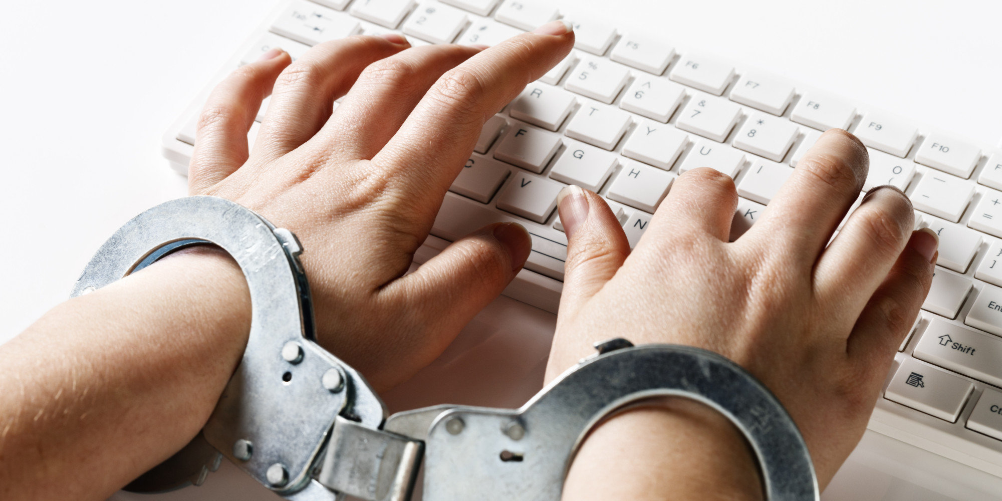 keyboard with handcuffs censorship graphic