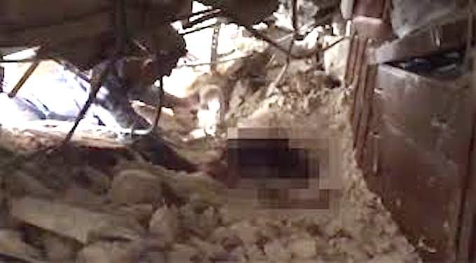 Click to enlarge Rescuing victim of Aleppo