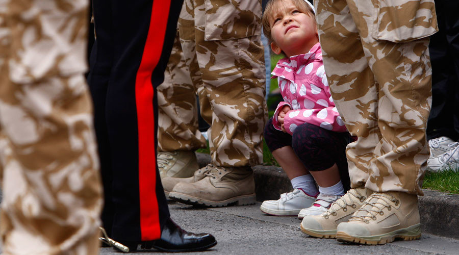 Child with UK soldiers