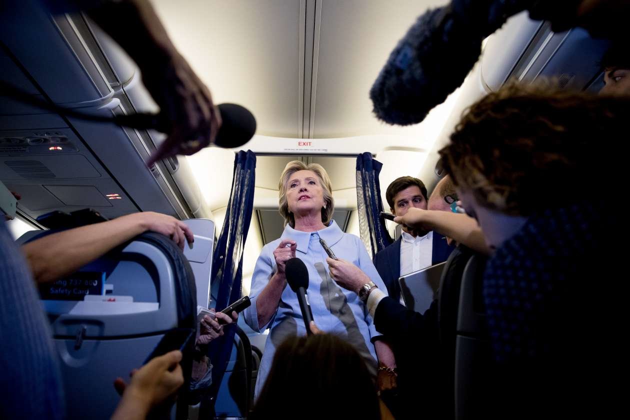 clinton and reporters
