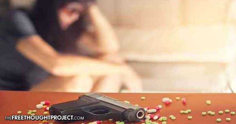 Girl with gun and pills