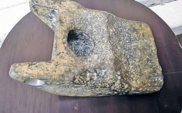 The aluminium piece looks as if it was a handmade object 