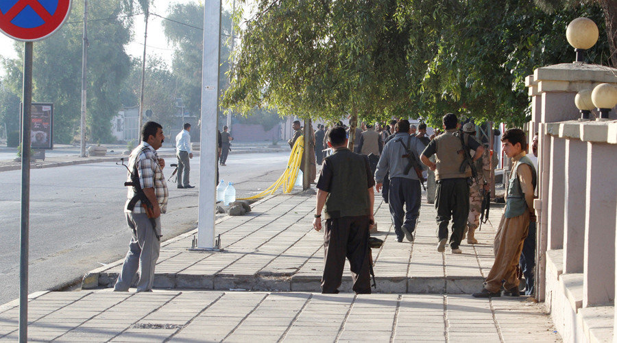 Peshmerga forces with Kurdish security personnel