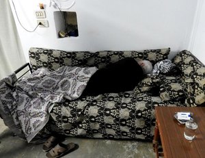 Click to enlarge Elderly near-blind man