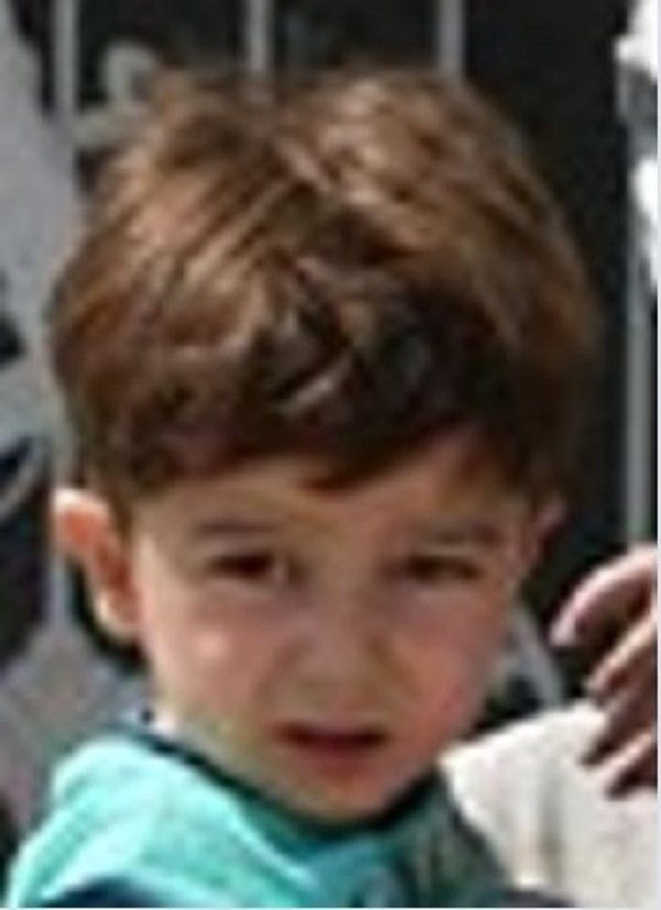Click to enlarge rescued boy