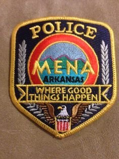 MENA police badge