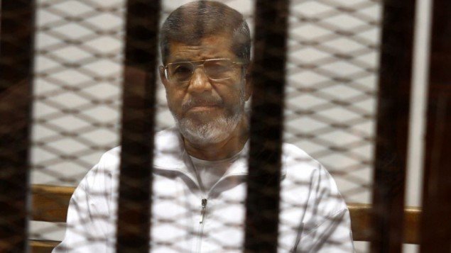 Click to enlarge morsi in jail