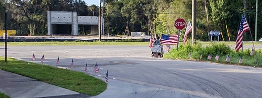 Florida homeless man US flags