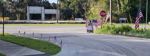 Click to enlarge Florida homeless man US flags