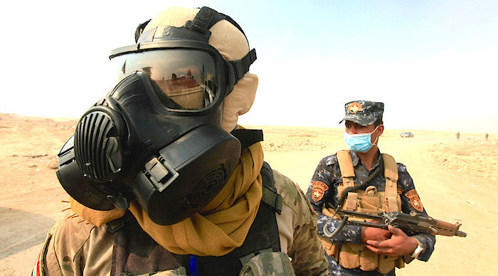 Click to enlarge two Iraqi soldiers gas mask