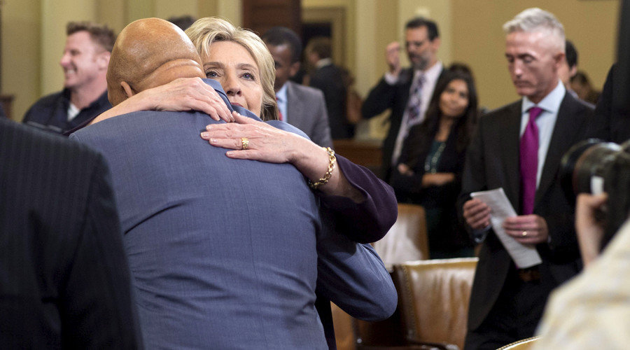 Click to enlarge Hillary Clinton hugs U.S. Representative Elijah Cummings