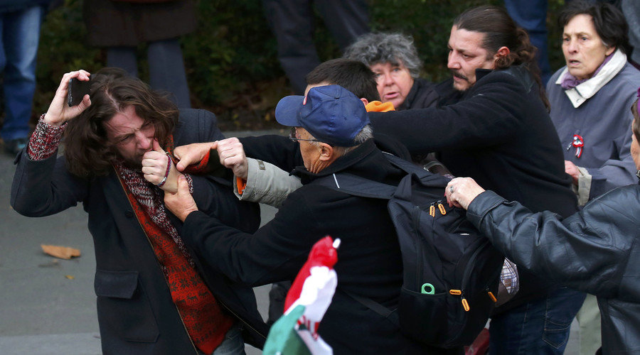 Pro- and anti-government supporters scuffle in Budapest, Hungary