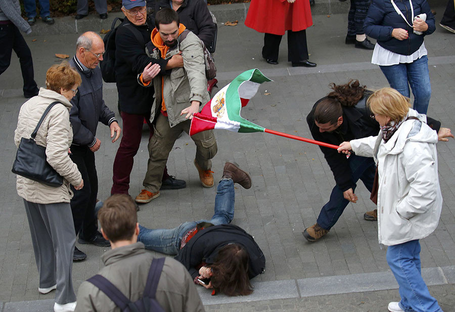 Pro- and anti-government supporters scuffle near Budapest, Hungary
