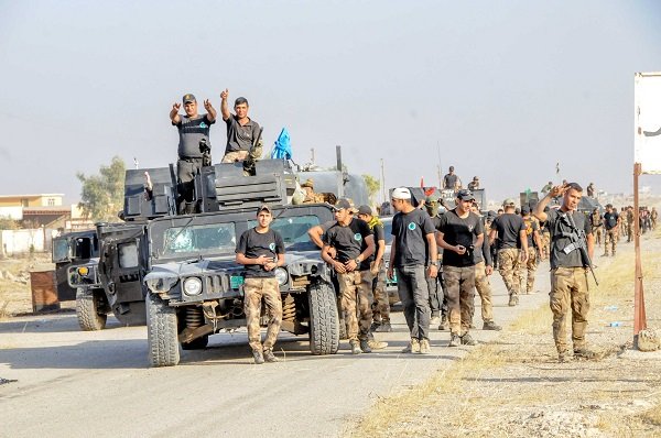 Click to enlarge Yazidi fighters taking part in the Iraqi army's operation to liberate Mosul.