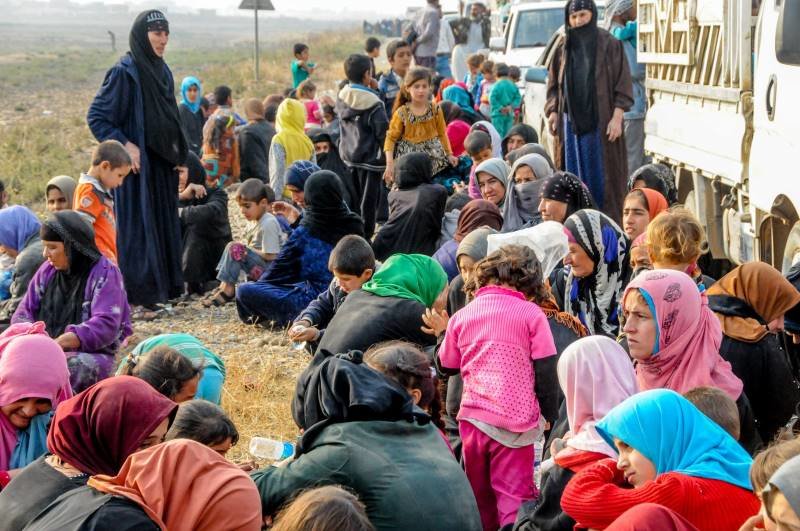 Click to enlarge RefugeesMosul