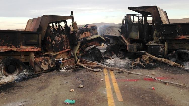 Click to enlarge burned_trucks