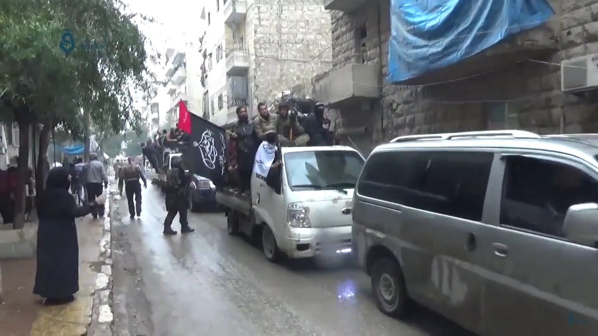 Aleppo moderate rebels wave al nusra al qaeda flags