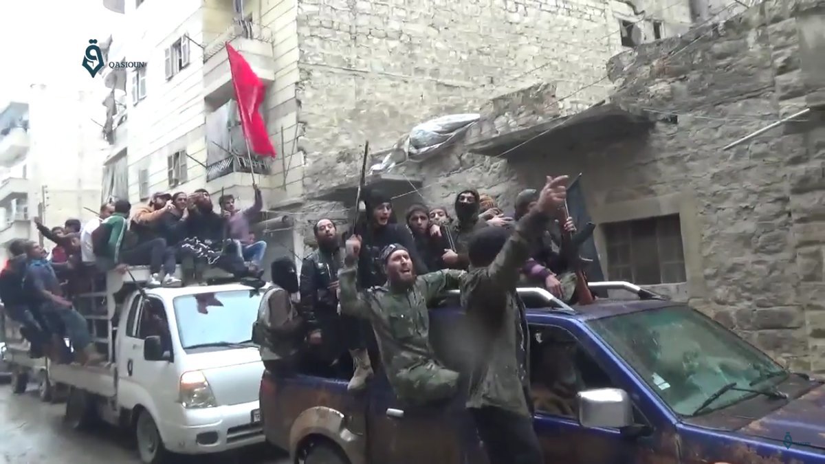 Aleppo moderate rebels wave al nusra al qaeda flags