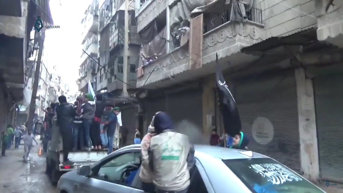 Aleppo moderate rebels wave al nusra al qaeda flags