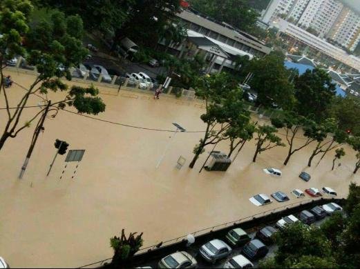 Click to enlarge The flash floods brought Penang to its knees, halting traffic and submerging homes in various parts of the city
