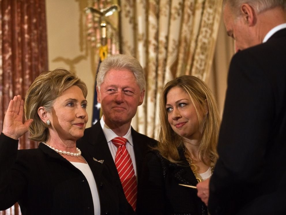 Hillary Clintony sworn in by Vice President Joe Biden Bill Clinton and daughter Chelsea 