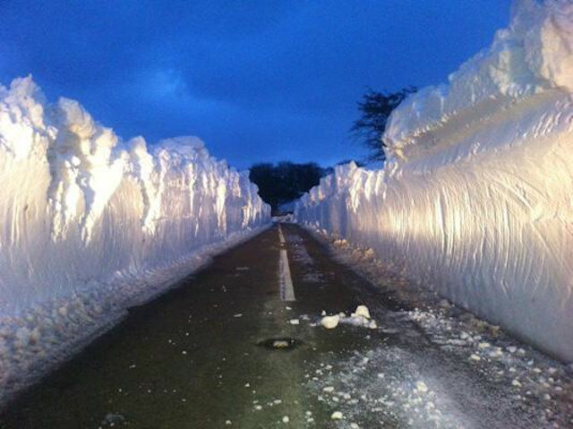 Snow banks on plowed road