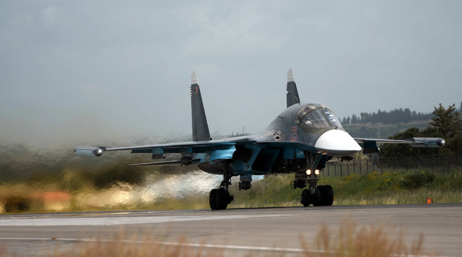 Click to enlarge A Russian Su-30 fighter aircraft takes off from the Hmeimim airbase in Syria