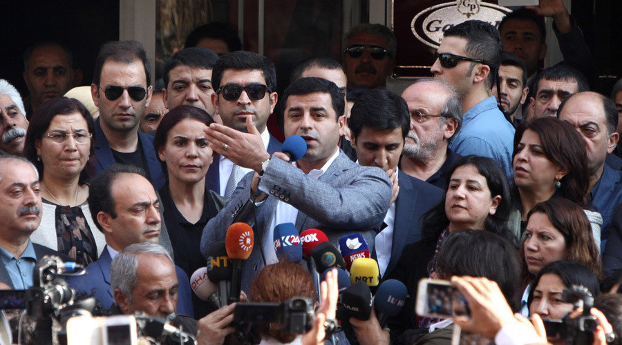 Click to enlarge Selahattin Demirtas, co-leader of the pro-Kurdish Peoples' Democratic Party (HDP), talks during a gathering to protest against the arrest of the city's popular two joint mayors for alleged links to terrorism, in the southeastern city of Diyarbakir, Turkey