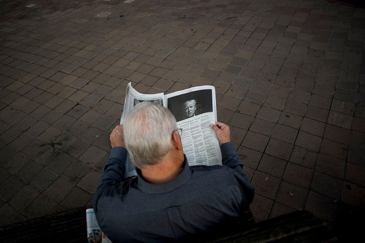 elderly man reading