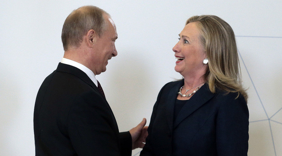 Russia's President Vladimir Putin (L) meets U.S. Secretary of State Hillary Clinton