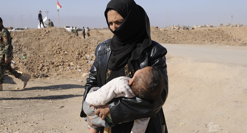 Click to enlarge Iraqi woman and baby