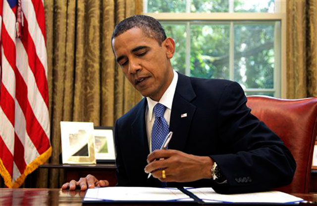 Click to enlarge obama signing