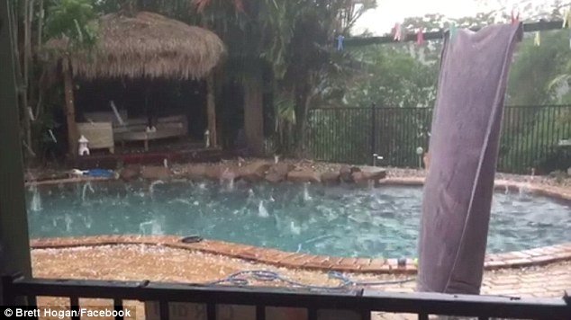 Click to enlarge Shocked residents filmed as massive hailstones crashed to the earth, with 5cm chunks of ice coming down in Ipswich