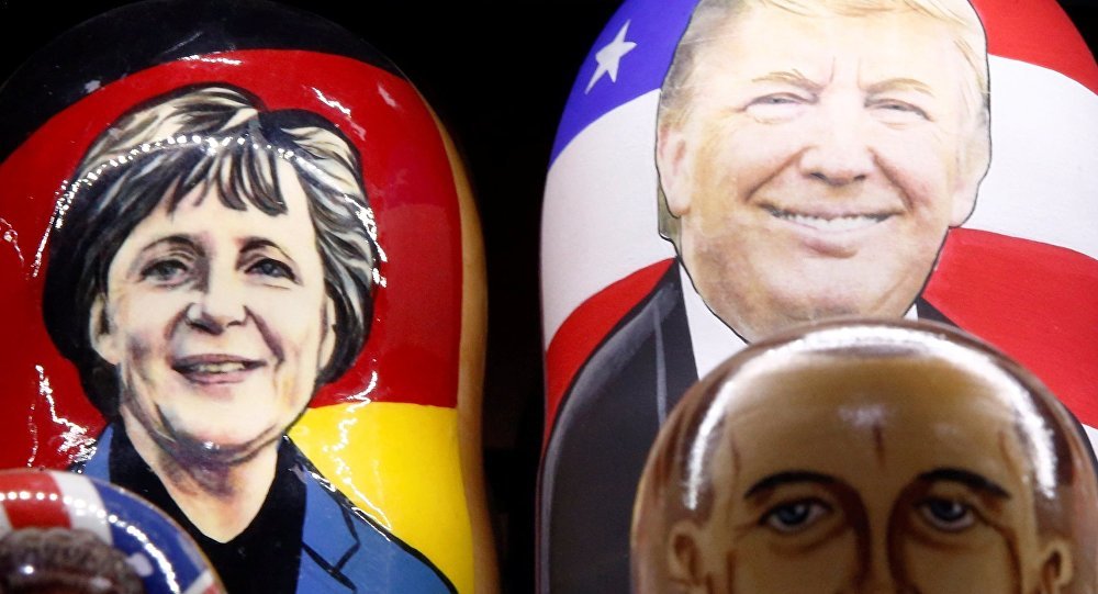 Click to enlarge Painted Matryoshka dolls of Merkel, Trump