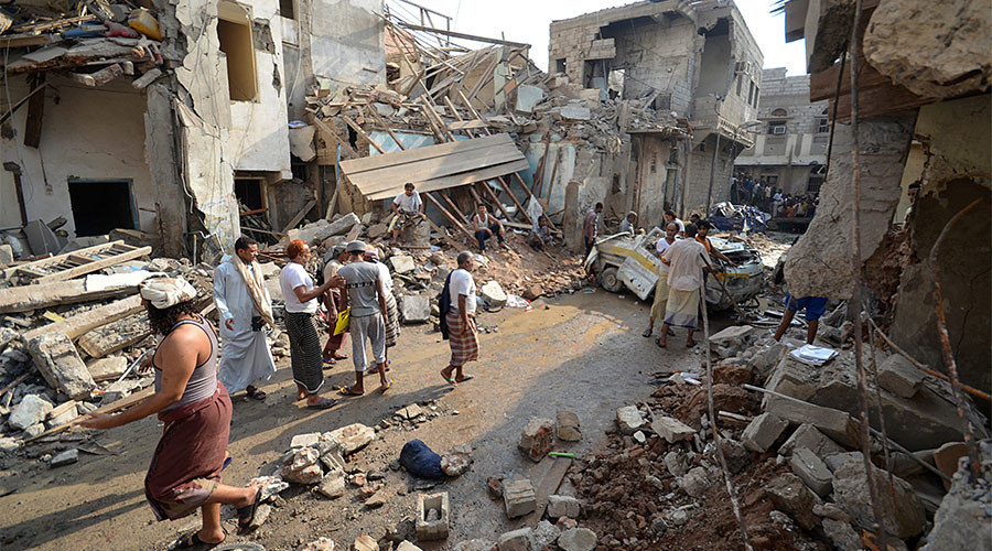 Click to enlarge People gather at the site of a Saudi-led air strike in the Red Sea port city of Hodeidah, Yemen